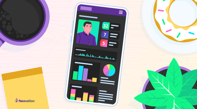 A smartphone laying on a table, surrounded by a cup of coffee, a donut, a plant, and a sticky note pad. On the phone screen, is a fabricated UI of a microlearning platform. The UI shows a user dashboard with a photo of the user at the top with a few stats beside it, and various charts and graphs below.