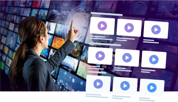 Woman tapping on a wall of videos,