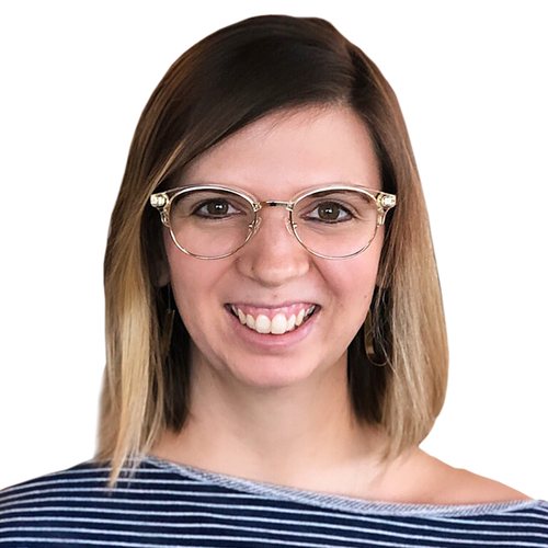 Laura Burke, smiling, with shoulder-length brown and blond hair and glasses, in a striped shirt